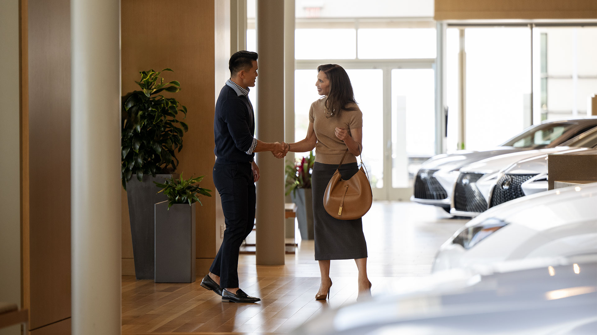 A Lexus Consultant greeting a guest